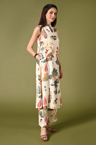 Off white printed coords set with high closed neck and matching wide leg pants.
•	Floral prints all over the top.
•	High close neck with button, sleeveless, sleeves comes separately with the top.
•	Matching printed bottom wide leg pants with double sided elastic.
•	Chanderi rayon material.
