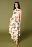 Off white printed coords set with high closed neck and matching wide leg pants.
•	Floral prints all over the top.
•	High close neck with button, sleeveless, sleeves comes separately with the top.
•	Matching printed bottom wide leg pants with double sided elastic.
•	Chanderi rayon material.
