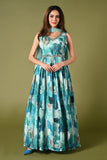 Printed blue occasion wear anarkali gown with worked neck, belt with plain dupatta.
•	Anarkali type top prints all over the body.
•	V neck, mirror and pearl work around the v neck.
•	Sleeves attached separately with the top along with the worked belt.
•	Plain dupatta with printed border.
